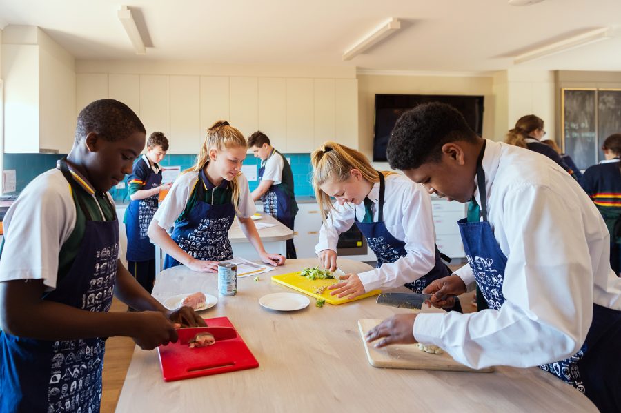 Middle School students develop real-life kitchen skills.