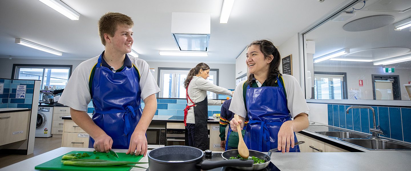 Students cooking in Kitchen Garden Program